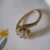 Swirl Solitaire Cubic Zirconia Brass Ring