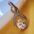 Gold Tone Brass Infinity Teardrop CZ Pendant