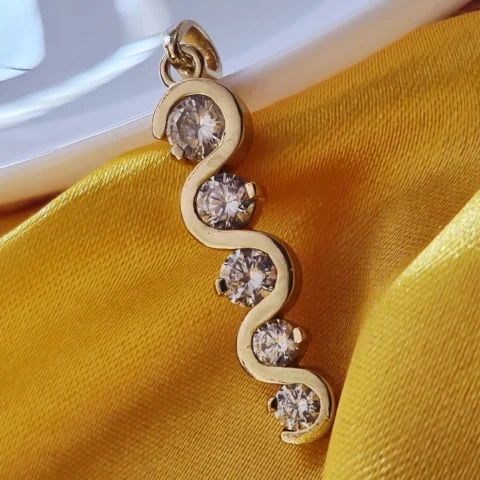 Gold Tone Brass Wave CZ Pendant