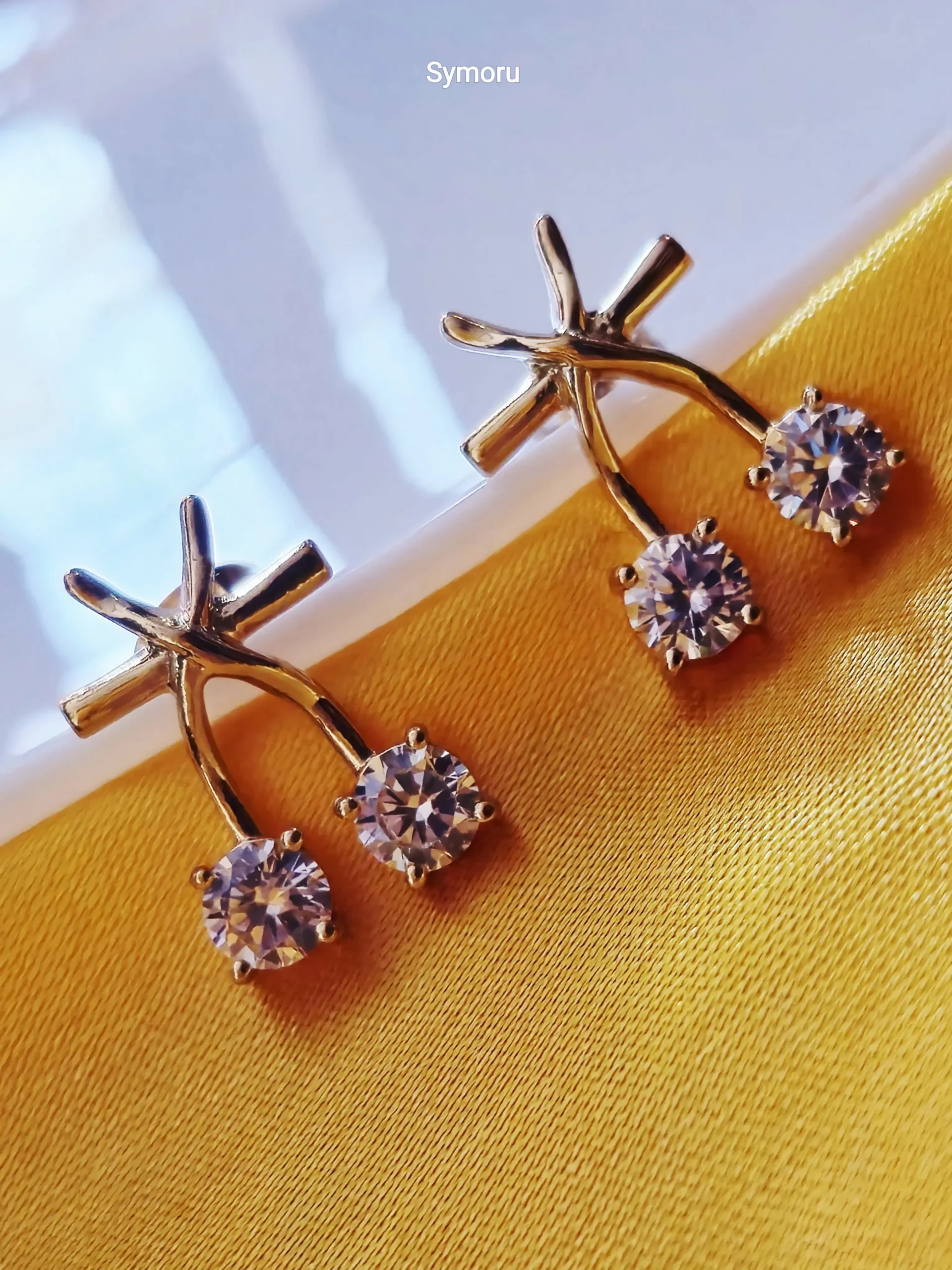 Gold Tone Brass Cross Arc Dual CZ Stud Earrings