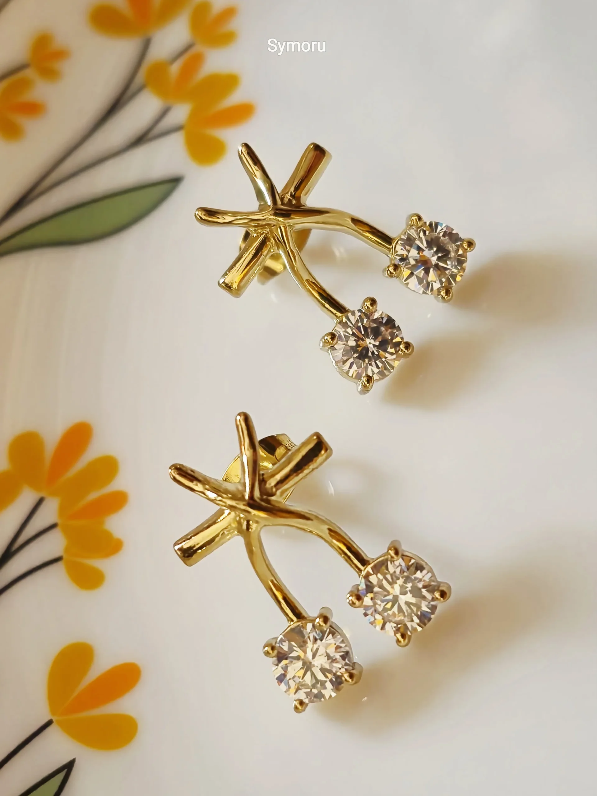 Gold Tone Brass Cross Arc Dual CZ Stud Earrings | Minimalist Diamond Look Curve Earrings for Women | Elegant Daily & Party Wear by Symoru - Image 3