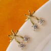 Gold Tone Brass Cross Arc Dual CZ Stud Earrings