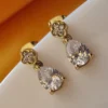 Gold Tone Brass Floral Stud with Pear Cut CZ Drop Earrings