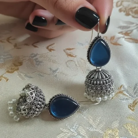 Oxidized Brass Transparent Blue Stone Jhumka Earrings with Pearl Drops